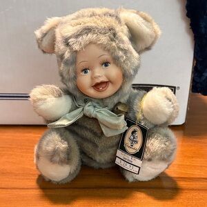 Vintage Geppeddo Cuddle Plush Porcelain Baby Doll with Bow “Casey Kitten”